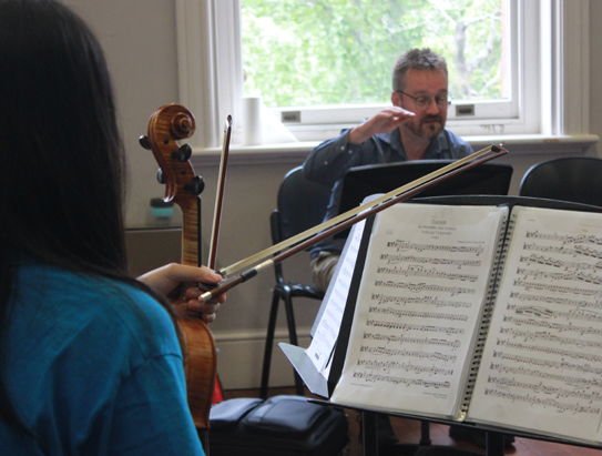 Head of Woodwind and Clarinet Faculty David Thomas during his coaching session with the Piccolo Quartet