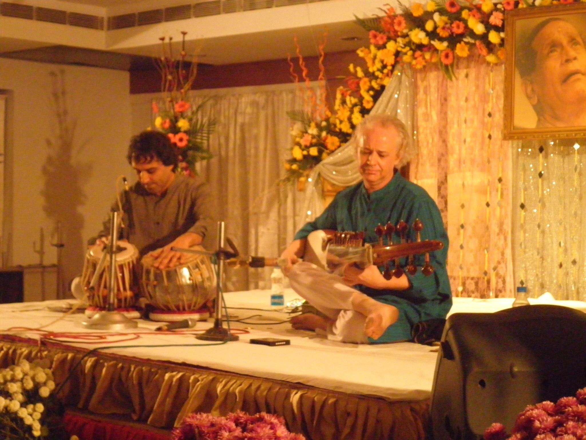 Photo Source: Adrianmcneil.com. Adrian McNeilwith Bobby Singh in Choudhury House, Kolkata